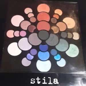 Stila " Color Wheel eye shadow palette" 37 colors. Almost all colors never used.